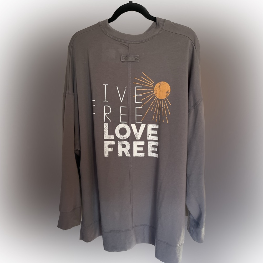 Flirtatude long sleeve tshirt. XXL side slits.